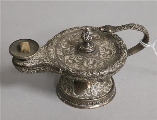 An Edwardian engraved silver club lighter, modelled as a lamp with serpent handle, London, 1905, length 11.5cm.